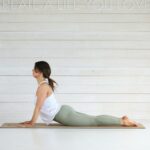 필라테스 10년 뒤의 내 모습: “노화는 선택이다,” 장기 수련이 선사하는 삶의 풍경 Woman doing cobra pose on yoga mat