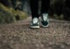 “플렉스 테리오가 대세: 걷기에 재미와 건강 더하는 ‘걷기 명상’ 실천법” a person standing on a gravel road with their shoes on
